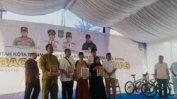 Kapolresta Barelang Hadiri Pembagian 1.000 Karung Beras untuk Warga Sekupang